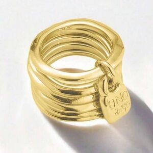 New in Package Uno de 50 Gold tone Stack ring Size 8